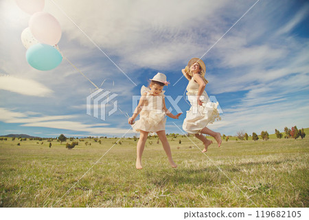 Young mother and her daughter having fun in nature park Young mother and her daughter having fun in nature park 119682105