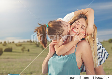 Young mother and her daughter having fun in nature park 119682106