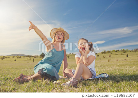 Young mother and her daughter having fun in nature park Young mother and her daughter having fun in nature park 119682107