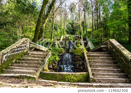 Famous water stairway Fonte Fria in the magical ancient forest of Bussaco in Luso, Aveiro in Portugal 119682308