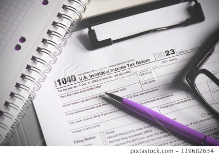 US Tax form is on a table 119682634