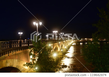 Bordeaux, France. Night view of the Pont Pierre over the Garonne River on August 14, 2024. Bordeaux, France. Night view of the Pont Pierre over the Garonne River on August 14, 2024. 119682874