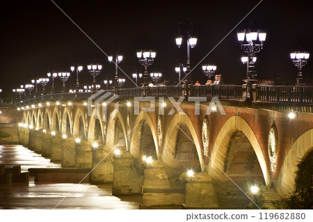 Bordeaux, France. Night view of the Pont Pierre over the Garonne River on August 14, 2024. Bordeaux, France. Night view of the Pont Pierre over the Garonne River on August 14, 2024. 119682880