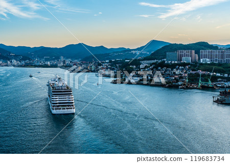 Cruise ship arriving at Nagasaki Port (SevenSeas Explorer) from Megami Ohashi Bridge [Nagasaki City] 119683734