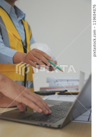 Construction and structure concept of Engineer or architect meeting for project working with partner and engineering tools on model building and blueprint in working site, contract for both companies. 119684876