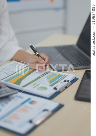 Business Documents, Auditor businesswoman checking searching document legal prepare paperwork or report for analysis TAX time,accountant Documents data contract partner deal in workplace office Business Documents, Auditor businesswoman checking searching document legal prepare paperwork or report for analysis TAX time,accountant Documents data contract partner deal in workplace office 119684889