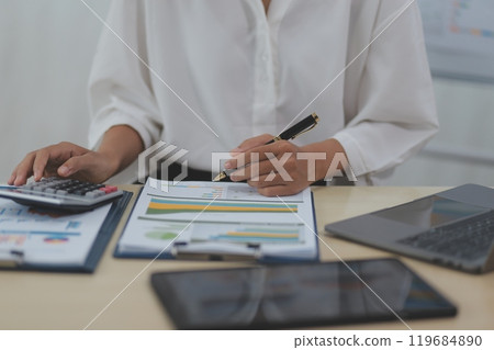 Business Documents, Auditor businesswoman checking searching document legal prepare paperwork or report for analysis TAX time,accountant Documents data contract partner deal in workplace office Business Documents, Auditor businesswoman checking searching document legal prepare paperwork or report for analysis TAX time,accountant Documents data contract partner deal in workplace office 119684890