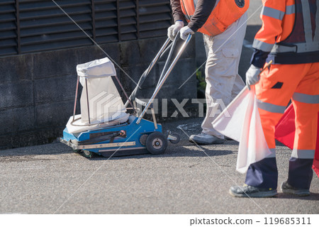 Road construction Clean sweeper White line drawing 119685311