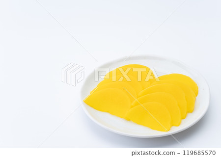 Pickled radish on a plate Pickled radish on a plate 119685570