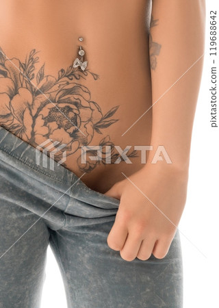 Slim tattooed girl topless isolated shot Slim tattooed girl topless isolated shot 119688642