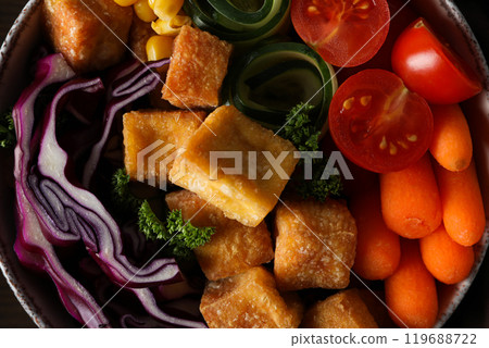 Fried tofu salad in a bowl close-up Fried tofu salad in a bowl close-up 119688722