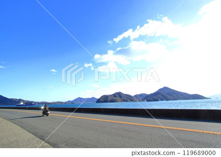 Bikers riding along the seaside road feeling the sea breeze 119689000