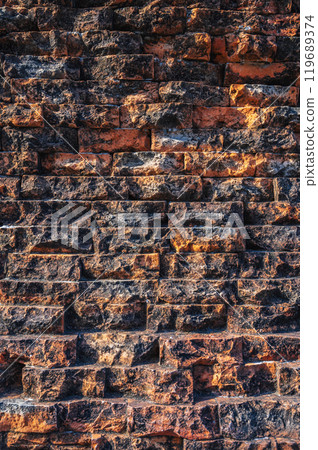 texture of the old antique brick wall of ancient temple in Asia in close-up texture of the old antique brick wall of ancient temple in Asia in close-up 119689374