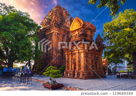 Ancient landmark of Po Nagar Cham Towers in Nha Trang in Vietnam. Famous tourist place with heritage ruins of the Cham temple religion complex Ancient landmark of Po Nagar Cham Towers in Nha Trang in Vietnam. Famous tourist place with heritage ruins of the Cham temple religion complex 119689389