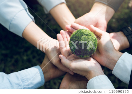 Concept of the Environment World Earth Day. Hands holding green earth, Saving environment, and environmentally sustainable. 119690555
