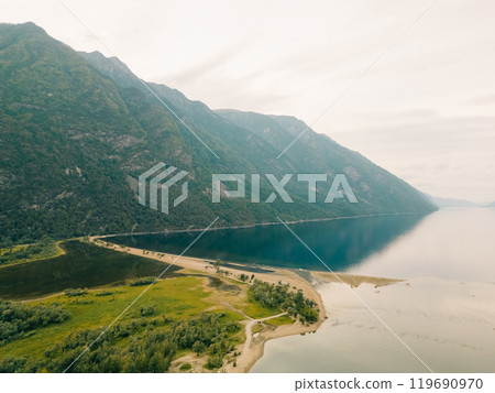 Aerial view of Teletskoye lake in the Altai Mountains in summer. Aerial view of Teletskoye lake in the Altai Mountains in summer. 119690970