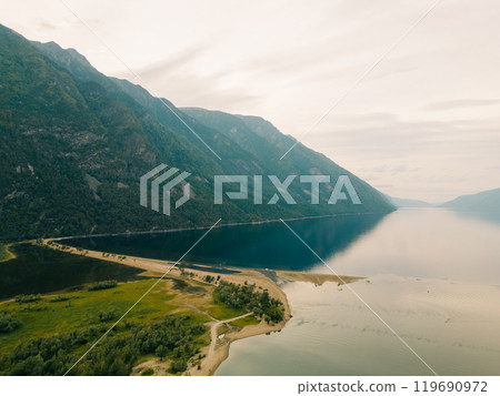 Aerial view of Teletskoye lake in the Altai Mountains in summer. Aerial view of Teletskoye lake in the Altai Mountains in summer. 119690972
