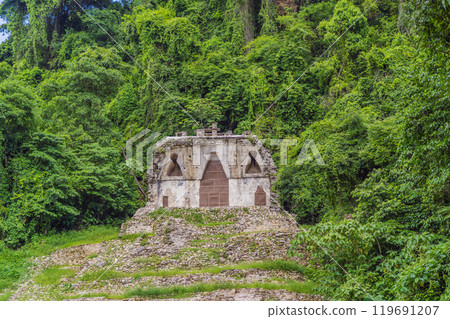 The ancient pyramids of Palenque in Mexico, surrounded by lush jungle. Iconic archaeological site showcasing Mayan culture and history. Travel, history, and adventure concept The ancient pyramids of Palenque in Mexico, surrounded by lush jungle. Iconic archaeological site showcasing Mayan culture and history. Travel, history, and adventure concept 119691207