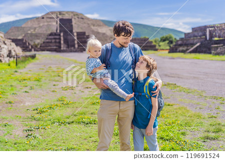 Father with his toddler and teenage sons exploring Teotihuacan, Mexico. Cultural heritage, ancient ruins, and archaeological adventure concept Father with his toddler and teenage sons exploring Teotihuacan, Mexico. Cultural heritage, ancient ruins, and archaeological adventure concept 119691524