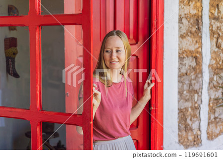 Female tourist in a colonial house in San Cristobal de las Casas, Mexico. Cultural exploration, architecture, and travel experience concept Female tourist in a colonial house in San Cristobal de las Casas, Mexico. Cultural exploration, architecture, and travel experience concept 119691601