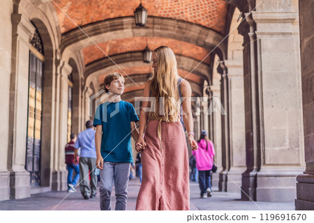 Mother and teenage son tourists in the central square of Mexico City, Zocalo. Family travel, cultural exploration, and historic architecture concept 119691670