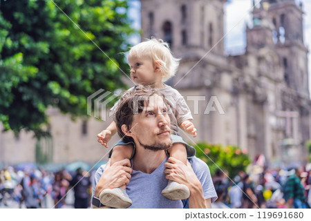 Father and son therists in front of Catedral Metropolitana de la Ciudad de Mexico. Cultural exploration, historic architecture, and travel experience concept 119691680
