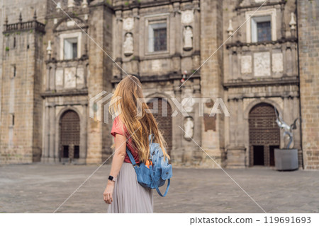 Female tourist in front of Catedral de Puebla, Mexico. Travel, cultural heritage, and historic architecture exploration concept Female tourist in front of Catedral de Puebla, Mexico. Travel, cultural heritage, and historic architecture exploration concept 119691693