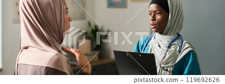 Discussing Medical Details in Healthcare Office Setting 119692626