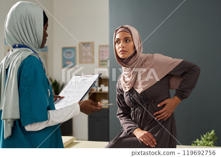 Discussing Healthcare with Muslim Medical Professional 119692756