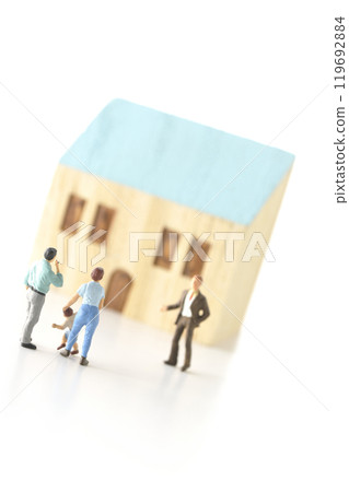 Image of a family buying a house and a real estate agent photographed on a white background Image of a family buying a house and a real estate agent photographed on a white background 119692884