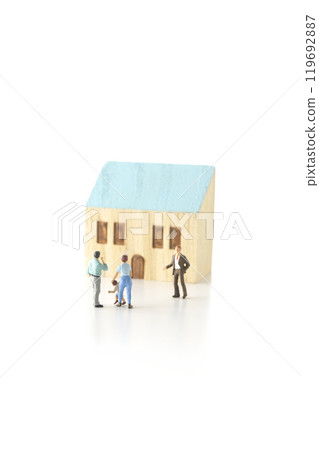 Image of a family buying a house and a real estate agent photographed on a white background 119692887