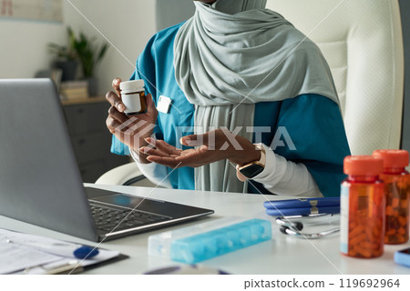 Healthcare Professional Explaining Medication Process 119692964