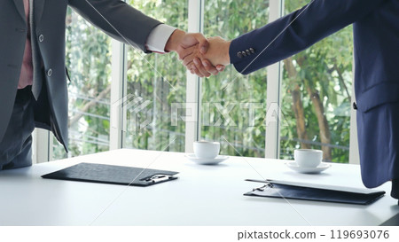 Businessman handshake manager recruitment team business. Partners shaking hands together greeting mergers and acquisitions. Shakehand Teamwork Partnership in office meeting room. Business concept Businessman handshake manager recruitment team business. Partners shaking hands together greeting mergers and acquisitions. Shakehand Teamwork Partnership in office meeting room. Business concept 119693076
