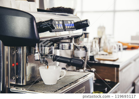 Black cup fresh coffee machine espresso barista beverage appliance froth bar cappuccino professional automatic equipment. Coffee aromatic drinking appliance freshness coffee machine home kitchen 119693117
