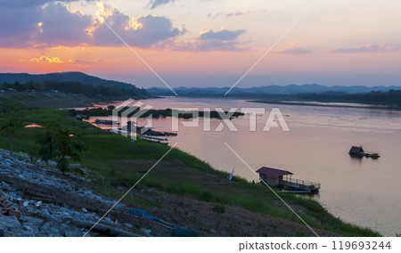 Tropical sea beach in summer time Purple sky on sunny day. Golden sand beach sea peaceful scenery on the beach. Travel vacation seaside outdoor. Ocean island beautiful dramatic Magenta landscape 119693244