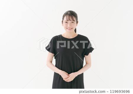 A woman wearing a black dress 119693696