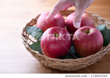 Apples in a basket 119693830
