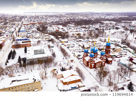 Aerial view of Church of the Intercession in winter in the city Petrovsk. Aerial view of Church of the Intercession in winter in the city Petrovsk. 119694814