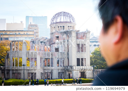 A man gazing at the Atomic Bomb Dome 119694979