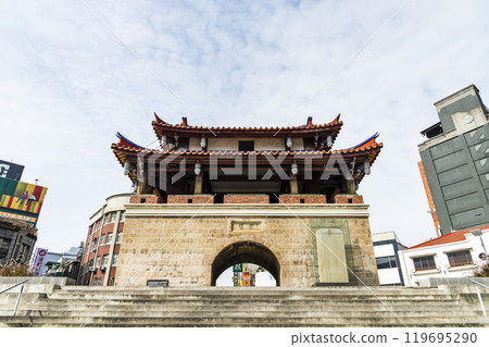 Building view of the Yin Hsi East Gate in Hsinchu City, Taiwan. Built in the 11th year of Yongzheng in the Qing Dynasty. 119695290