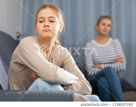 Portrait of upset teenager schoolgirl 119695580