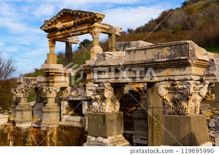 Partially reconstructed ancient fountain Nymphaeum of Trajan in Ephesus, Turkey Partially reconstructed ancient fountain Nymphaeum of Trajan in Ephesus, Turkey 119695990