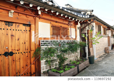Famous landmark Bukchon Hanok Village,  traditional cultural village in downtown Seoul, Jongno District. Beautiful cozy narrow street with old traditional Korean houses, Seoul, South Korea 119697292