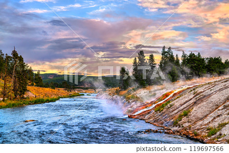 Heavy runoff from Excelsior Geyser to Firehole River at Yellowstone National Park, Wyoming, United States Heavy runoff from Excelsior Geyser to Firehole River at Yellowstone National Park, Wyoming, United States 119697566