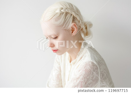 delicate fashionable portrait of an albino girl with white hair delicate fashionable portrait of an albino girl with white hair 119697715