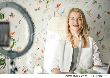 Coaching as a key tool in developing and fine-tuning an impactful online image, of woman 119698335