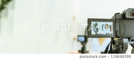 Banner influencer Beauty blogger video production vlogger female fashion blog online cosmetic recording woman lifestyle. Banner female vlogger show cloths cosmetics vlog live social media copy space 119698398