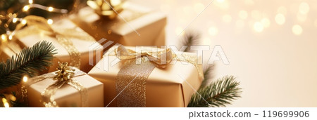 Gold-wrapped Christmas gifts with sparkling ribbons under soft lights. Festive holiday gift-giving atmosphere for Christmas or New Year. 119699906