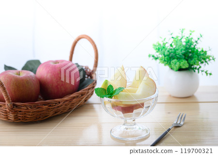 Apples on the windowsill (cut image) 119700321