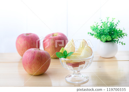 Apples on the windowsill (cut image) 119700335